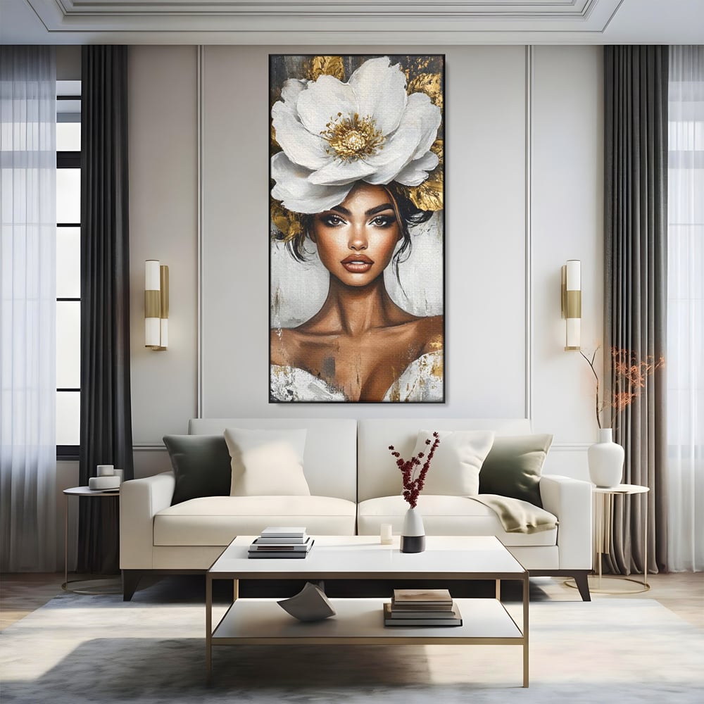 Tablou canvas cu tablou canvas cu portret de femeie si floare, in rama de aluminiu negru, pe perete intr-un living